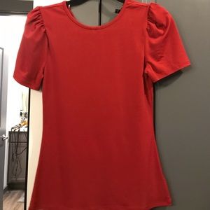 Red express work top with puffy shoulders